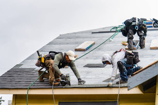 Professional Roofing technician working in Sea Cliff, NY